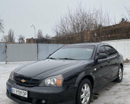 Черный Шевроле Эванда, объемом двигателя 2 л и пробегом 250 тыс. км за 2750 $, фото 1 на Automoto.ua
