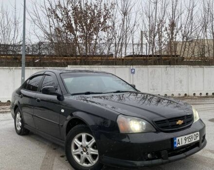 Черный Шевроле Эванда, объемом двигателя 2 л и пробегом 260 тыс. км за 3700 $, фото 1 на Automoto.ua