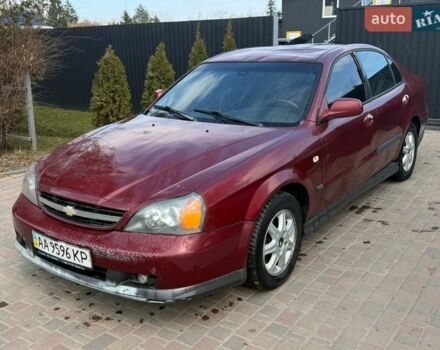 Чорний Шевроле Еванда, об'ємом двигуна 2 л та пробігом 200 тис. км за 1650 $, фото 1 на Automoto.ua
