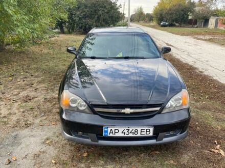 Черный Шевроле Эванда, объемом двигателя 2.5 л и пробегом 184 тыс. км за 4059 $, фото 1 на Automoto.ua