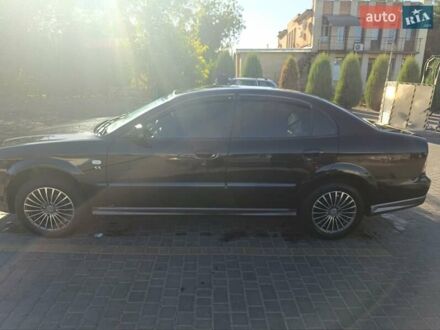 Чорний Шевроле Еванда, об'ємом двигуна 2 л та пробігом 232 тис. км за 4500 $, фото 1 на Automoto.ua