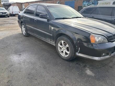 Черный Шевроле Эванда, объемом двигателя 2.5 л и пробегом 250 тыс. км за 2100 $, фото 1 на Automoto.ua