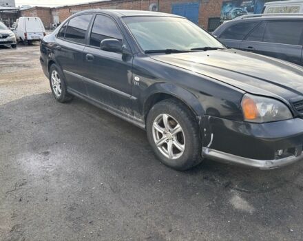 Черный Шевроле Эванда, объемом двигателя 2.5 л и пробегом 250 тыс. км за 2100 $, фото 1 на Automoto.ua