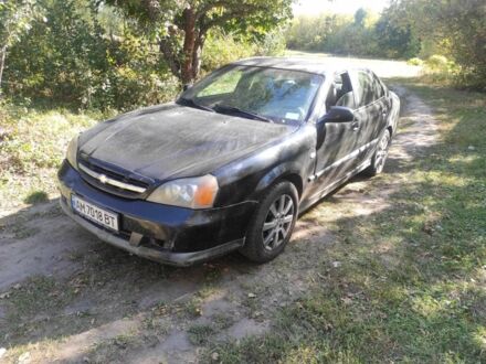 Чорний Шевроле Еванда, об'ємом двигуна 2.5 л та пробігом 250 тис. км за 2500 $, фото 1 на Automoto.ua