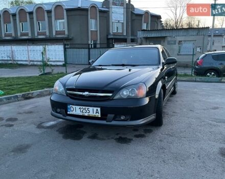 Чорний Шевроле Еванда, об'ємом двигуна 2.5 л та пробігом 179 тис. км за 4200 $, фото 1 на Automoto.ua
