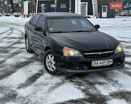 Черный Шевроле Эванда, объемом двигателя 2.5 л и пробегом 165 тыс. км за 4400 $, фото 1 на Automoto.ua