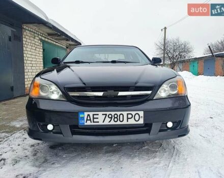 Черный Шевроле Эванда, объемом двигателя 2 л и пробегом 197 тыс. км за 5200 $, фото 1 на Automoto.ua