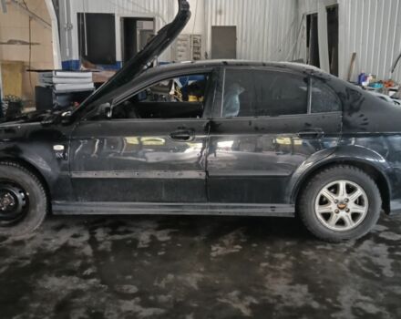 Черный Шевроле Эванда, объемом двигателя 2 л и пробегом 294 тыс. км за 1354 $, фото 1 на Automoto.ua