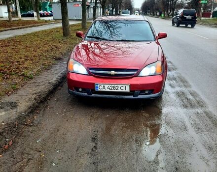 Червоний Шевроле Еванда, об'ємом двигуна 2 л та пробігом 240 тис. км за 4300 $, фото 4 на Automoto.ua