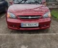 Красный Шевроле Эванда, объемом двигателя 2 л и пробегом 199 тыс. км за 4000 $, фото 1 на Automoto.ua