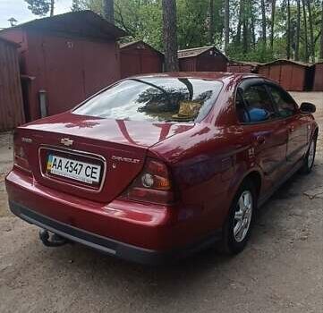 Красный Шевроле Эванда, объемом двигателя 2 л и пробегом 177 тыс. км за 4500 $, фото 3 на Automoto.ua