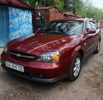 Красный Шевроле Эванда, объемом двигателя 2 л и пробегом 177 тыс. км за 4500 $, фото 1 на Automoto.ua