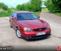 Красный Шевроле Эванда, объемом двигателя 2 л и пробегом 340 тыс. км за 2350 $, фото 1 на Automoto.ua