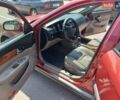 Червоний Шевроле Еванда, об'ємом двигуна 2 л та пробігом 320 тис. км за 4000 $, фото 1 на Automoto.ua