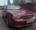 Красный Шевроле Эванда, объемом двигателя 2 л и пробегом 177 тыс. км за 4500 $, фото 1 на Automoto.ua