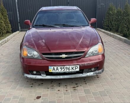 Красный Шевроле Эванда, объемом двигателя 2 л и пробегом 220 тыс. км за 1650 $, фото 5 на Automoto.ua
