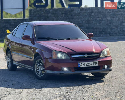 Червоний Шевроле Еванда, об'ємом двигуна 2 л та пробігом 240 тис. км за 2499 $, фото 1 на Automoto.ua