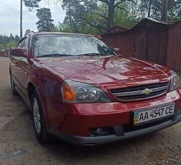 Красный Шевроле Эванда, объемом двигателя 2 л и пробегом 177 тыс. км за 4500 $, фото 1 на Automoto.ua