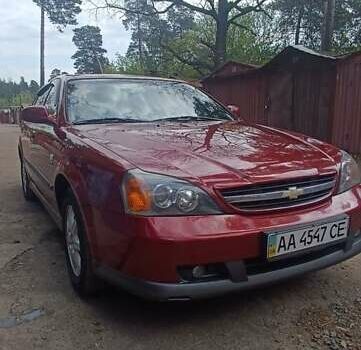 Красный Шевроле Эванда, объемом двигателя 2 л и пробегом 177 тыс. км за 4500 $, фото 1 на Automoto.ua