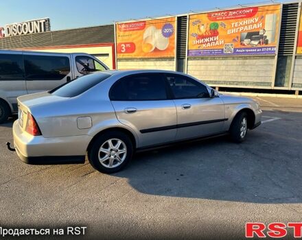 Серый Шевроле Эванда, объемом двигателя 2 л и пробегом 187 тыс. км за 3650 $, фото 6 на Automoto.ua