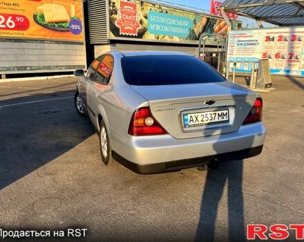 Серый Шевроле Эванда, объемом двигателя 2 л и пробегом 187 тыс. км за 3650 $, фото 1 на Automoto.ua