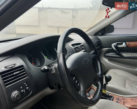 Сірий Шевроле Еванда, об'ємом двигуна 2 л та пробігом 255 тис. км за 2650 $, фото 9 на Automoto.ua