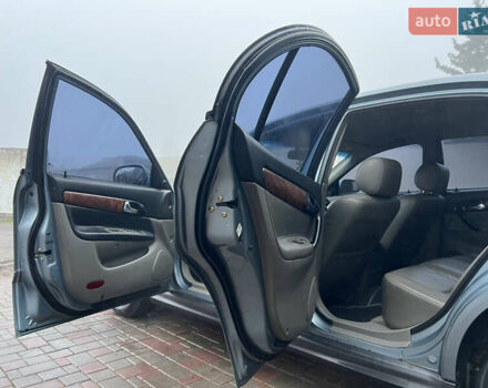 Сірий Шевроле Еванда, об'ємом двигуна 2 л та пробігом 255 тис. км за 2650 $, фото 4 на Automoto.ua