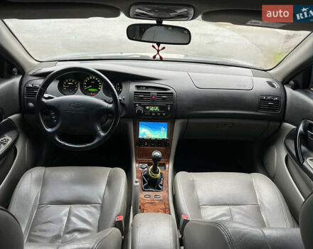 Сірий Шевроле Еванда, об'ємом двигуна 2 л та пробігом 255 тис. км за 2650 $, фото 8 на Automoto.ua
