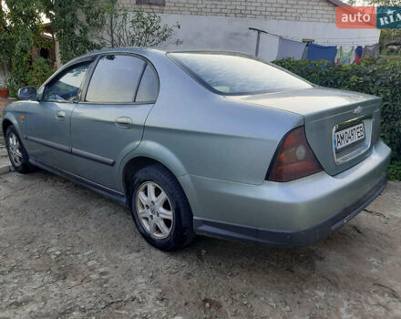 Серый Шевроле Эванда, объемом двигателя 2 л и пробегом 258 тыс. км за 4100 $, фото 1 на Automoto.ua