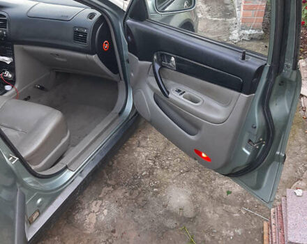 Серый Шевроле Эванда, объемом двигателя 2 л и пробегом 258 тыс. км за 4100 $, фото 3 на Automoto.ua