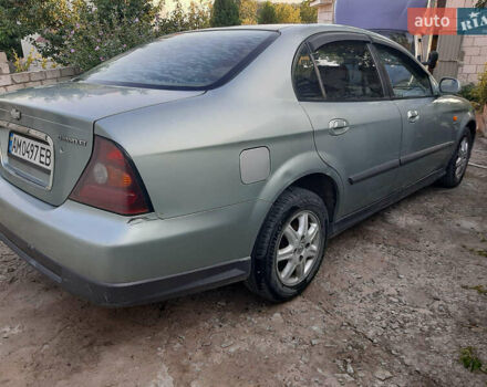 Серый Шевроле Эванда, объемом двигателя 2 л и пробегом 258 тыс. км за 4100 $, фото 2 на Automoto.ua