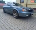 Сірий Шевроле Еванда, об'ємом двигуна 2 л та пробігом 240 тис. км за 3900 $, фото 3 на Automoto.ua
