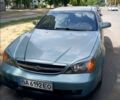 Сірий Шевроле Еванда, об'ємом двигуна 2 л та пробігом 170 тис. км за 3700 $, фото 1 на Automoto.ua