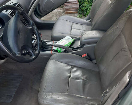 Серый Шевроле Эванда, объемом двигателя 2 л и пробегом 258 тыс. км за 4100 $, фото 4 на Automoto.ua