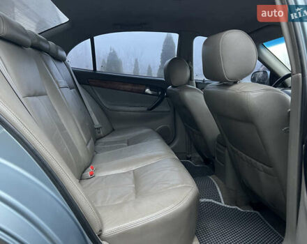 Сірий Шевроле Еванда, об'ємом двигуна 2 л та пробігом 255 тис. км за 2650 $, фото 6 на Automoto.ua