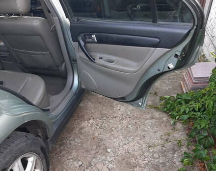 Серый Шевроле Эванда, объемом двигателя 2 л и пробегом 258 тыс. км за 4100 $, фото 7 на Automoto.ua