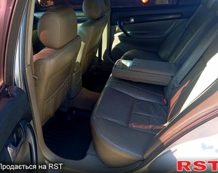 Серый Шевроле Эванда, объемом двигателя 2 л и пробегом 288 тыс. км за 3400 $, фото 8 на Automoto.ua