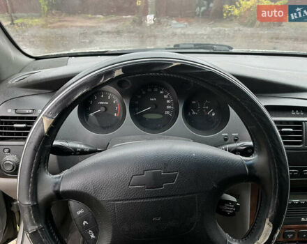 Серый Шевроле Эванда, объемом двигателя 2 л и пробегом 300 тыс. км за 3200 $, фото 15 на Automoto.ua