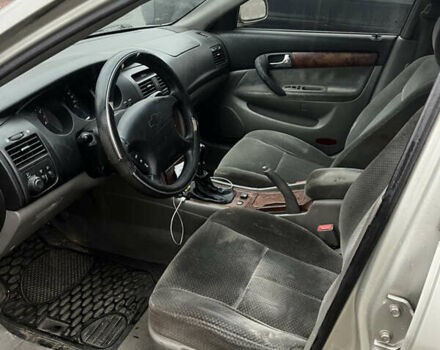 Серый Шевроле Эванда, объемом двигателя 2 л и пробегом 300 тыс. км за 3200 $, фото 13 на Automoto.ua