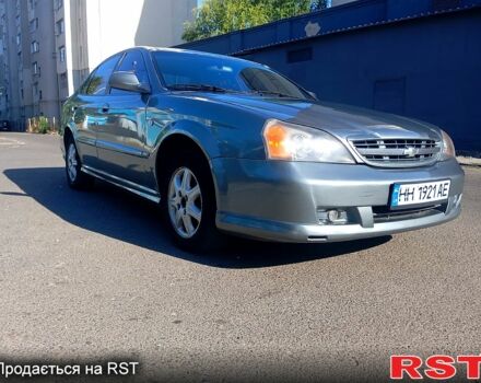 Серый Шевроле Эванда, объемом двигателя 2 л и пробегом 288 тыс. км за 3400 $, фото 2 на Automoto.ua