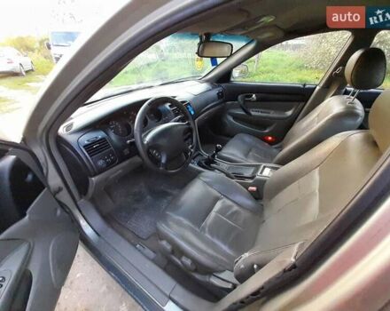 Серый Шевроле Эванда, объемом двигателя 2 л и пробегом 247 тыс. км за 2900 $, фото 4 на Automoto.ua