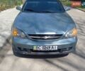 Серый Шевроле Эванда, объемом двигателя 2 л и пробегом 290 тыс. км за 3600 $, фото 1 на Automoto.ua