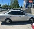 Сірий Шевроле Еванда, об'ємом двигуна 2 л та пробігом 137 тис. км за 2999 $, фото 1 на Automoto.ua