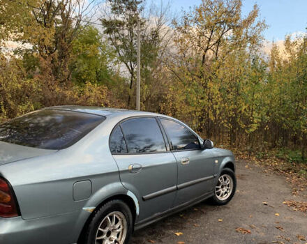 Серый Шевроле Эванда, объемом двигателя 2 л и пробегом 230 тыс. км за 2950 $, фото 2 на Automoto.ua