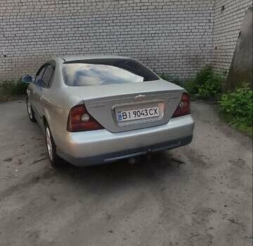 Сірий Шевроле Еванда, об'ємом двигуна 2 л та пробігом 237 тис. км за 4300 $, фото 2 на Automoto.ua