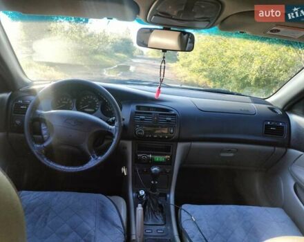 Серый Шевроле Эванда, объемом двигателя 2 л и пробегом 340 тыс. км за 3899 $, фото 9 на Automoto.ua