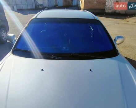 Сірий Шевроле Еванда, об'ємом двигуна 2 л та пробігом 330 тис. км за 3999 $, фото 2 на Automoto.ua