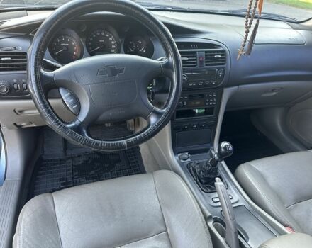 Серый Шевроле Эванда, объемом двигателя 2 л и пробегом 255 тыс. км за 2770 $, фото 15 на Automoto.ua