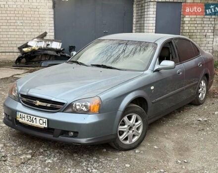 Сірий Шевроле Еванда, об'ємом двигуна 2 л та пробігом 173 тис. км за 3800 $, фото 11 на Automoto.ua