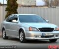 Серый Шевроле Эванда, объемом двигателя 2 л и пробегом 250 тыс. км за 2900 $, фото 1 на Automoto.ua